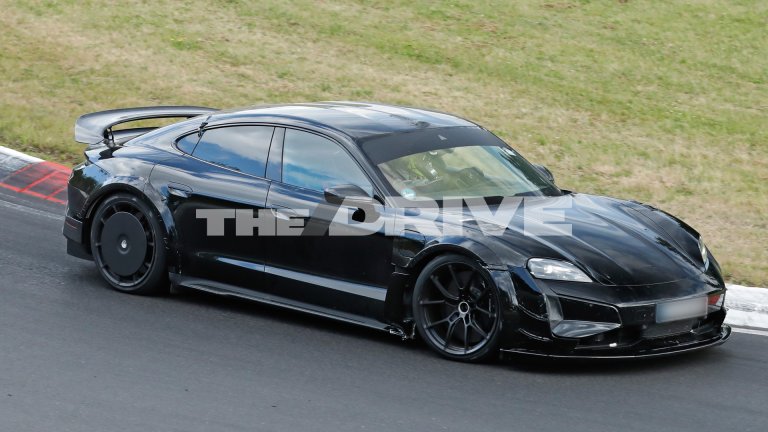 Special version of the Porsche Taycan spied testing with wings and aero.